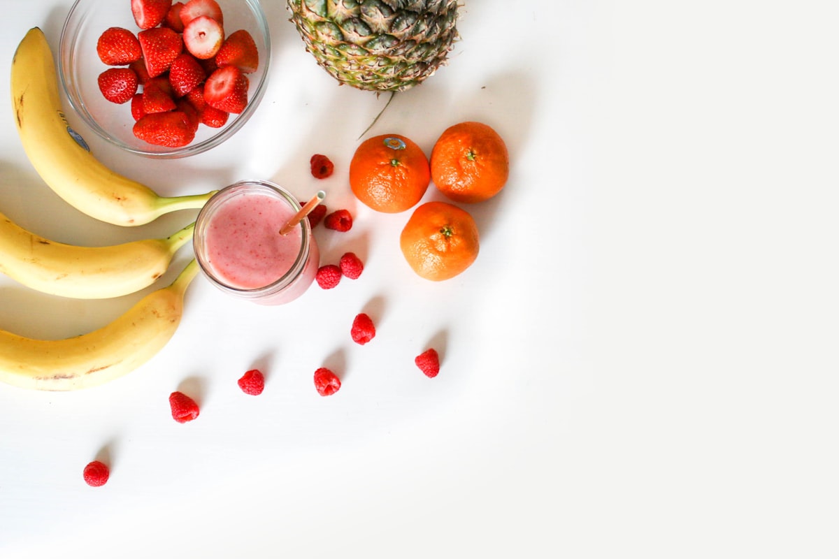 Diverse lunch ingredients artfully arranged on wooden board